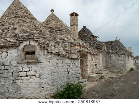 Unique Small South Italia City Alberobello With Antient Stones Conical Houses Trullo, Tourist Destin