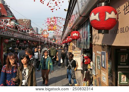 Tokyo, Japan - December 4, 2016: People Visit Nakamise Souvenir Shop Street Of Asakusa In Tokyo, Jap