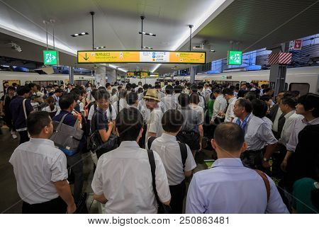Osaka, Japan - July 24 2015: Mass Of People Exiting Train At Jr Osaka Station