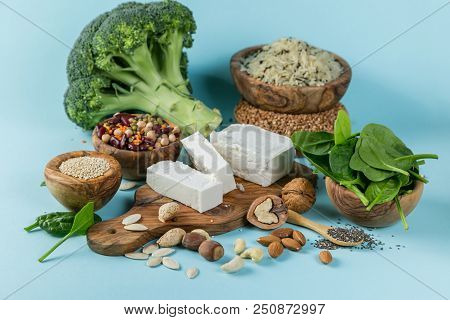 Selection Of Vegetarian Protein Sources - Healthy Diet Concent On Bright Blue Background