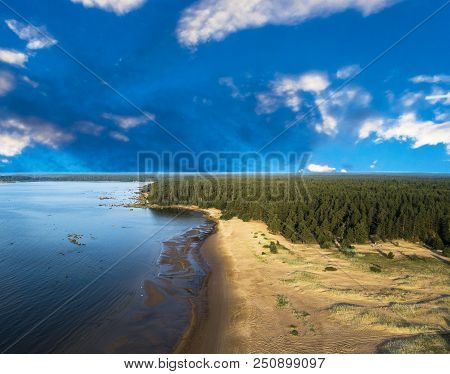 Aerial View Of Seashore With Beach, Lagoons And Coral Reefs. Coastline With Sand And Water. Tropical