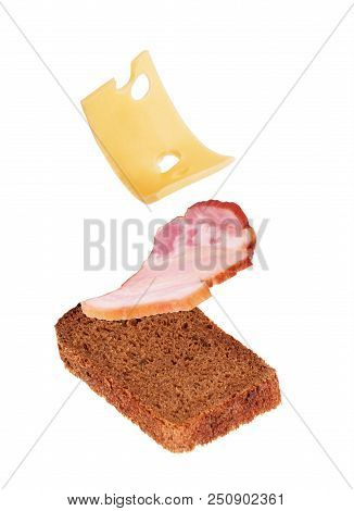 Sandwich With Bacon And Cheese On A White Background