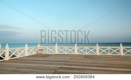 One Chair On Sea Coast, Concept Of Resort