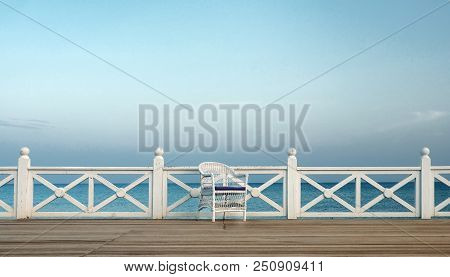 One Chair On Sea Coast, Concept Of Resort