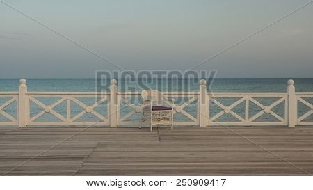 One Chair On Sea Coast, Concept Of Resort