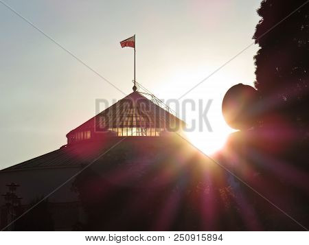 Sun Sunset Over Polish Senate And Parliament Building, Warsaw, Poland