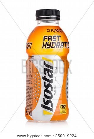 London, Uk - July 28, 2018:plastic Bottle Of Isostar Isotonic Sport Drink On White Background.