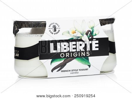 London, Uk - July 28, 2018: Pack Of Liberte Origins French Style Yogurt With Vanilla Flavour On Whit
