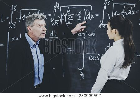 Angry Professor And Desk. Student And Formula. Teacher Of Mathematics. Reading Lecture. Students At 