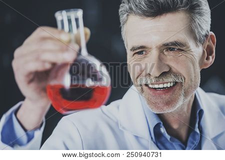 Happy Professor Look At Vial With Chemical Liquid. Educational Process. Biochemistry Discovering. Ex