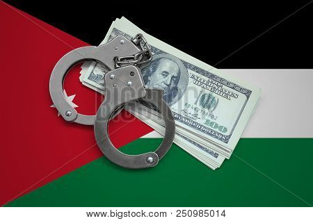 Jordan Flag  With Handcuffs And A Bundle Of Dollars. Currency Corruption In The Country. Financial C