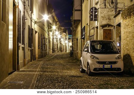 Ferrara, Italy - July, 23, 2018: cars parked in Ferrara, Italy, at night