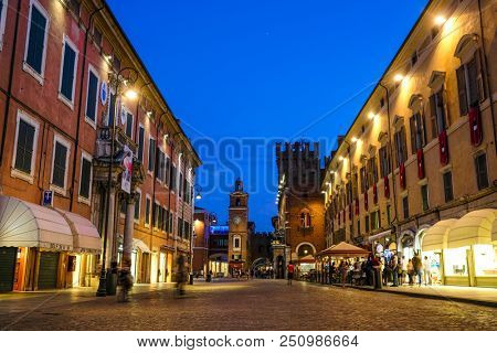 Ferrara, Italy - July, 23, 2018: street in the historical center of Ferrara at a night