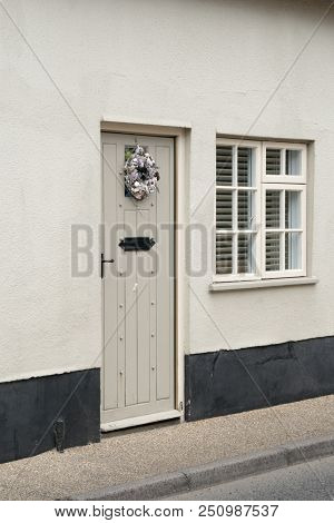 A Decorated Ancient Cottage Wooden Door And Widow