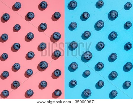 Blueberry Pattern. Minimalistic Concept. Top View Or Flat Lay. Blueberries Staggered On Two Colors B