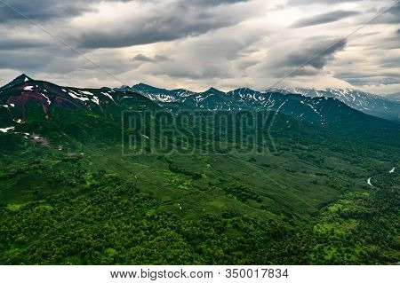 Panoramic View Of The City Petropavlovsk-kamchatsky And Volcanoes: Koryaksky Volcano, Avacha Volcano