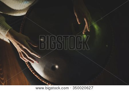 Beautiful Girls Hands Play Music On Hang