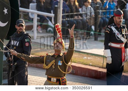 Amritsar India - Febuary 8, 2020: Indian Border Security Force Man Prepares To Lower Flags At Wagah 