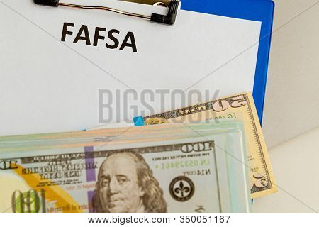Fafsa Empty Statement Document And Money At The Desk.