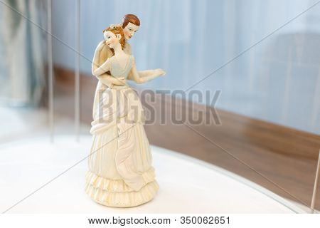 Figurine of a dancing young couple, a figurine on a shelf