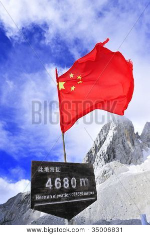 Chinese Flag at the Yu Long Xue Shan in Yunnan, China