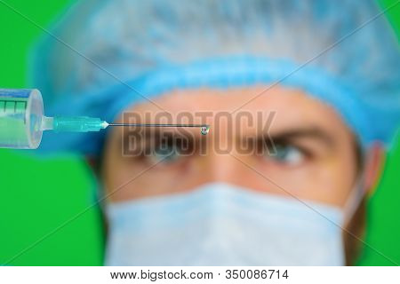 Injection. Immunization. Antibiotics. Doctor With Syringe Preparing For Injection. Doctor Warns Abou