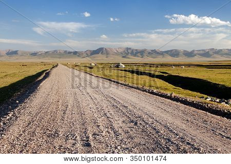 Unpaved Road And Yurts Near Son-kul Lake And Tian Shan Mountains In Kyrgyzstan