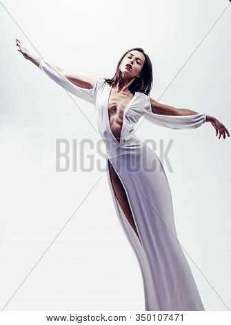 Beautiful Fairy Flying Girl In White Dress. Romantic Young Beauty As An Angel