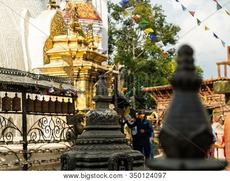 Ancient Cast Bronze Part Of The Structure In The Temple Complex Swayambhunath In Kathmandu.