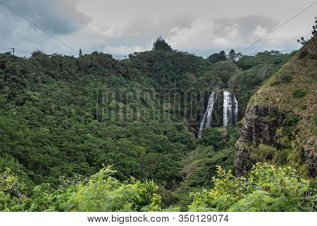 Nawiliwili, Kauai, Hawaii, Usa. - January 16, 2020: White Water Opaekaa Falls In Wider Landscape Sur