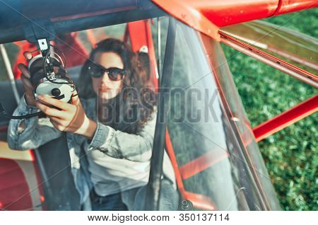 Female Attractive Pilot Of A Light Aircraft