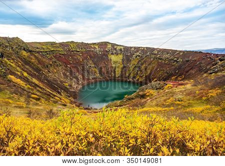 Volcanic Crater Kerid With Blue Lake Inside, At Autumn Day, Iceland Gold Circle Tourist Attraction.