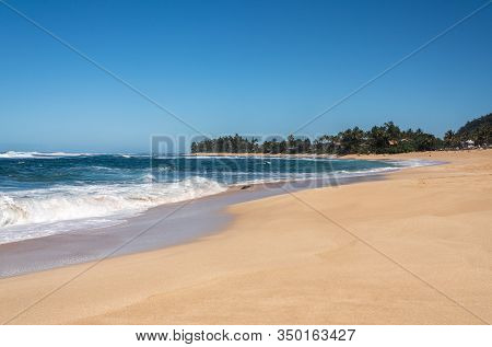 Almost Deserted Sandy Beach At Sunset Beach Park Near Banzai Pipeline On North Coast Of Oahu, Hawaii