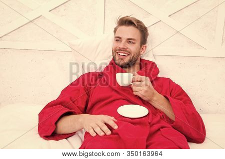 A Fresh Drink For Breakfast. Happy Man Drinking Coffee For Breakfast. Handsome Guy Enjoying His Brea
