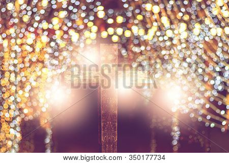 Wooden Cross Decoreted In Church Under The Ceremonial Lighting