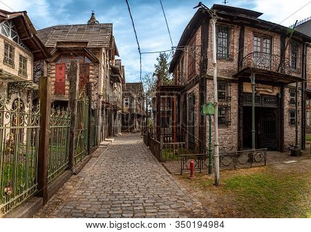 Gonzalez Catan, Argentina, September 28, 2019: Cobblestone Path Through Abandoned Buildings In The A