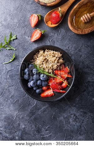 Healthy Vegan Diet Salad Quinoa With Blueberry,strawberry, Honey And Chia Seeds. Concept Sooper Food