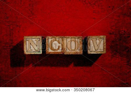 wood block with text ncov-2019 noval coronavirus