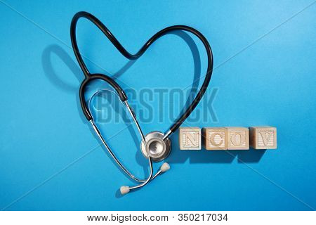 heart shaped stethoscope with text NCoV short name of Noval Coronavirus