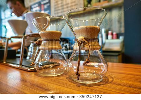 SHENZHEN, CHINA - CIRCA NOVEMBER, 2019: Chemex coffeemakers on display at Starbucks Reserve in Shenzhen.