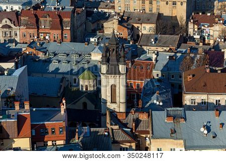 Beautiful View Of The Catholic Baroque Church On The Background Of Blue Sky. Amazing Cityscape With 