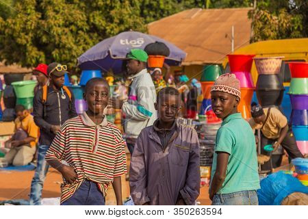 Bissau, Guinea-Bissau - January 5, 2020: portrait of African Kids looking at the camera in rural Guinea-Bissau