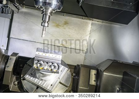 The 5-axis Cnc Milling Machine  Cutting The Aluminium V8 Engine Block  By Solid Ball Endmill Tools. 