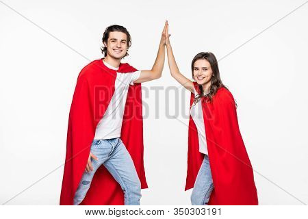 Young Couple Give Five Wear In Red Hero Cout Isolated On White Background