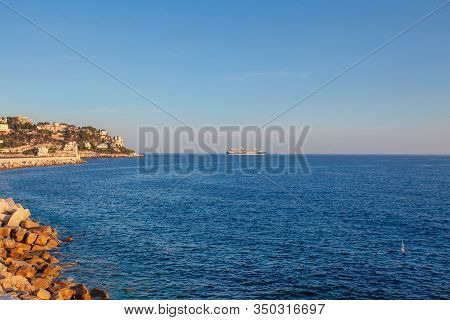 Pebble Beach With Sea Views On The Promenade Des Anglais In Nice, France