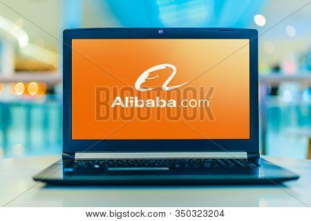 Laptop Computer Displaying Logo Of Alibaba