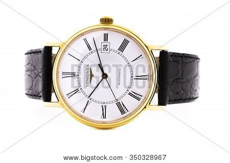 Saint-imier, Switzerland, 2.02.2020 - Longines Golden Or Steel Body With Leather Strap Watch Close-u