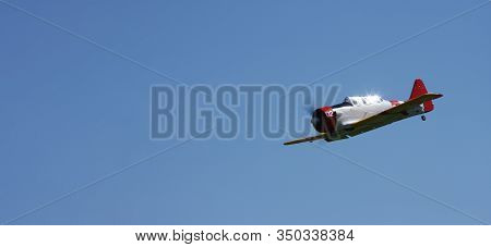 World War2 Plane In Flight With Blue Sky