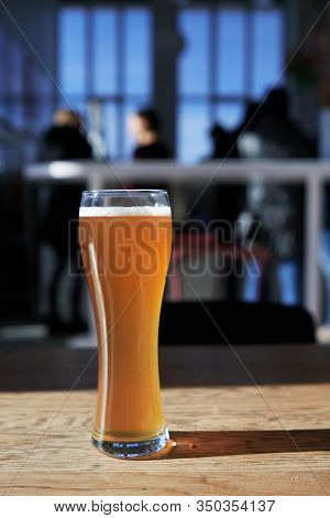 Sunlight Reflection On A Wheat Bier Or Weissbier In Munich, Germany