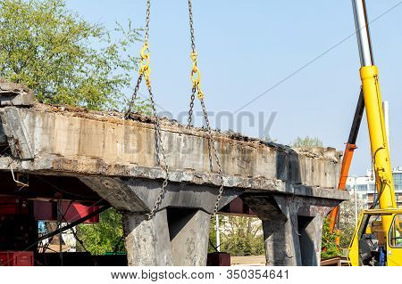 Constuction Site Heavy Machinery Industrial Background. Big Mobile Crane Working At City Building De